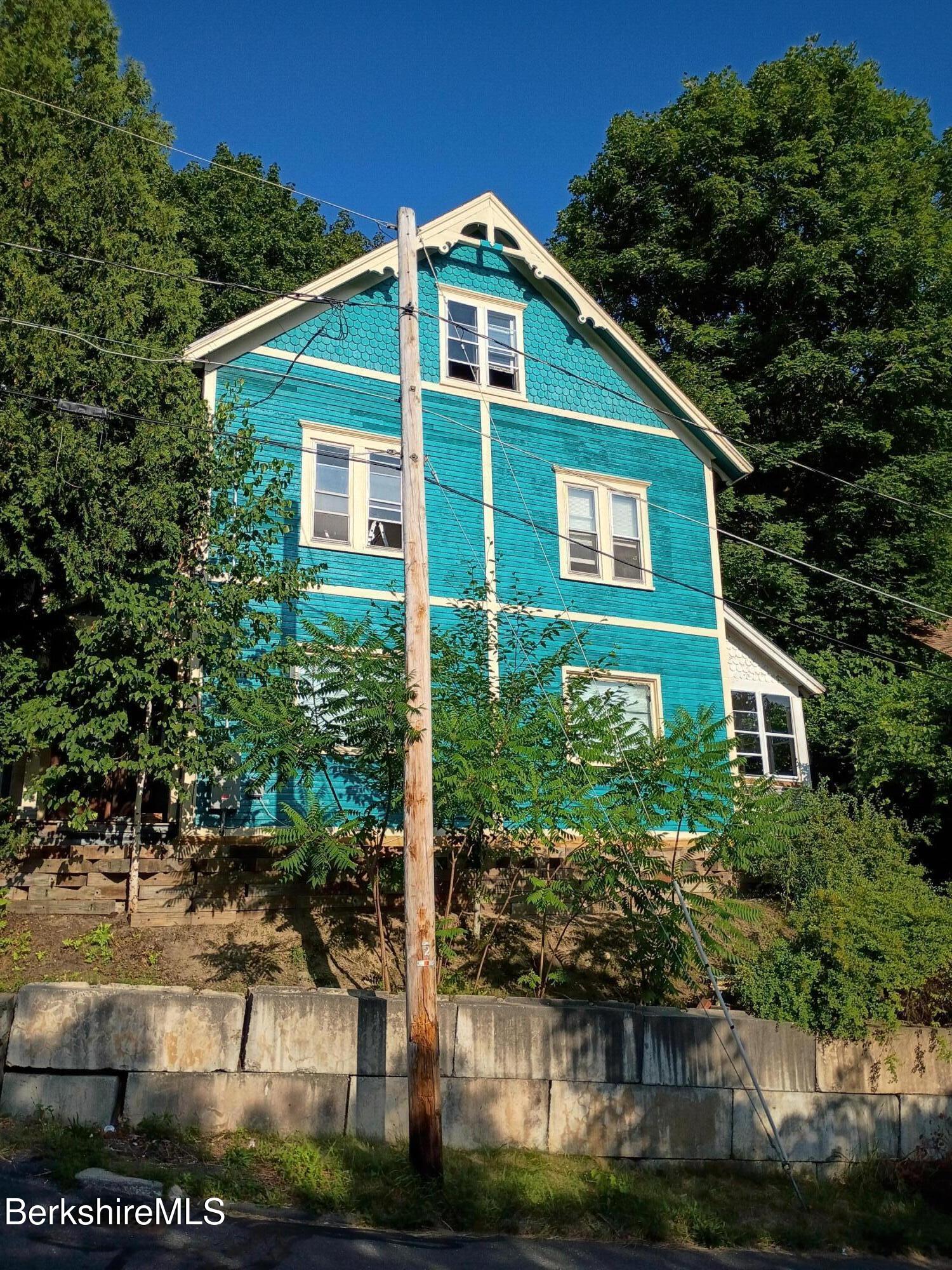 24 Franklin Street North Adams, MA 01247 - Photo 14 of 45 a front view of a house with a yard