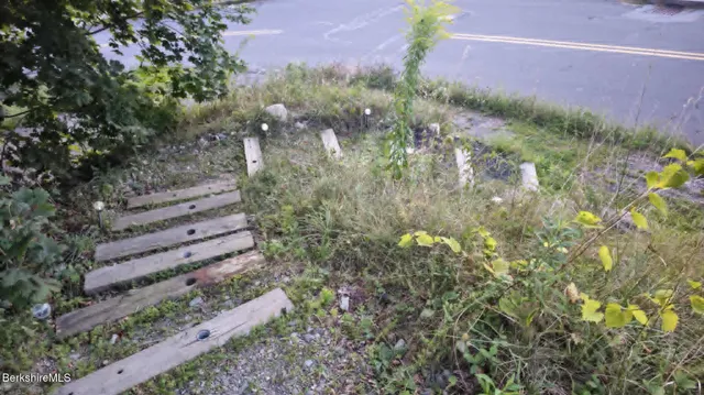 a view of storage and utility room with washer and dryer