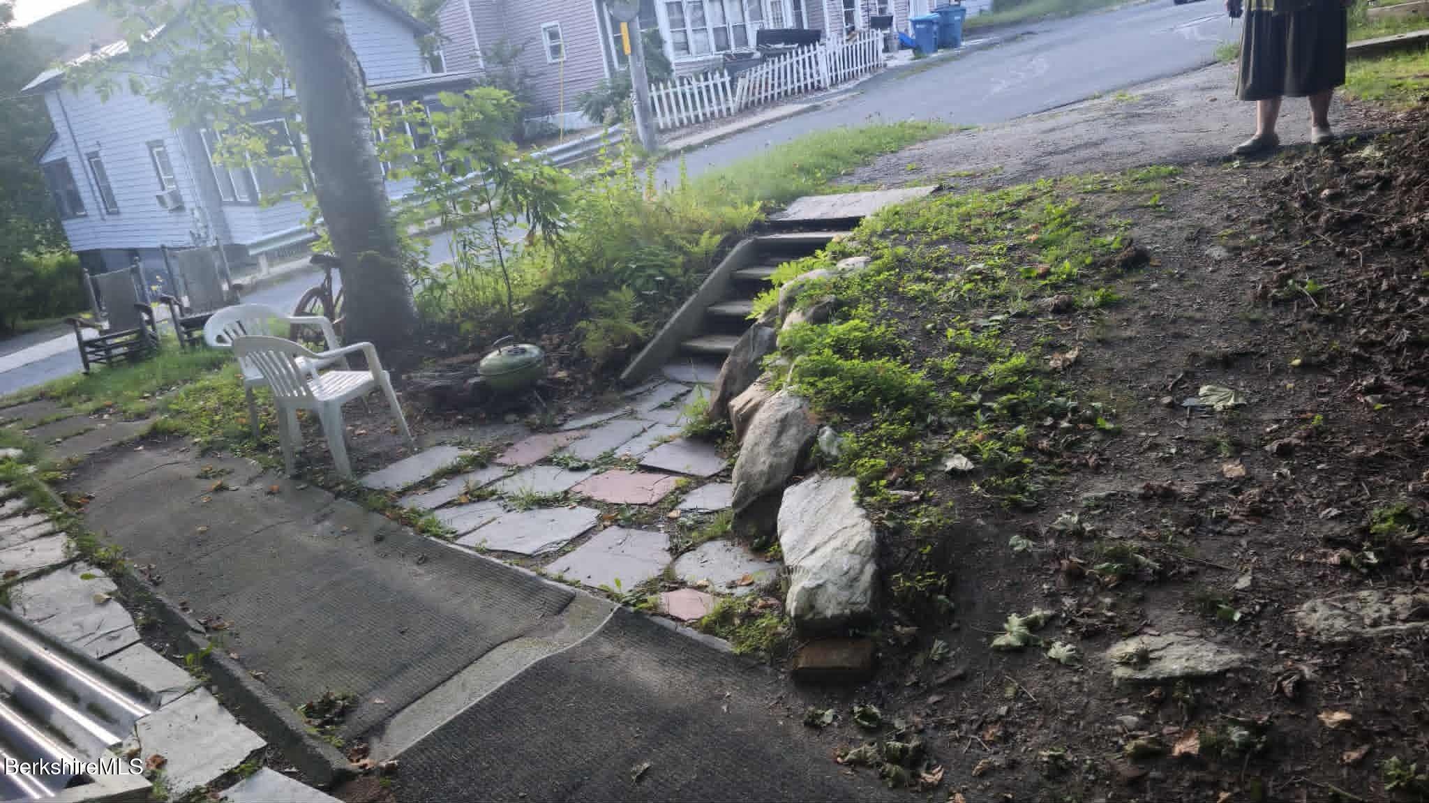 24 Franklin Street North Adams, MA 01247 - Photo 16 of 45 a backyard of a house with lots of green space