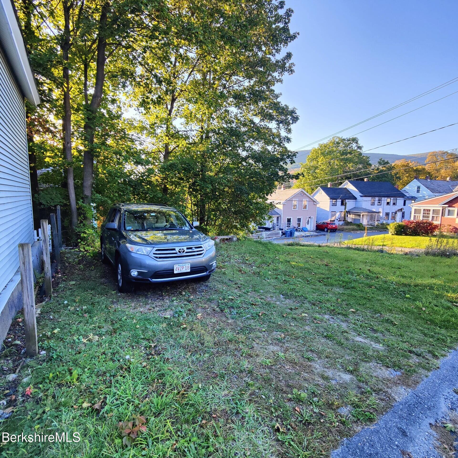 24 Franklin Street North Adams, MA 01247 - Photo 19 of 45 a view of a backyard with swimming pool
