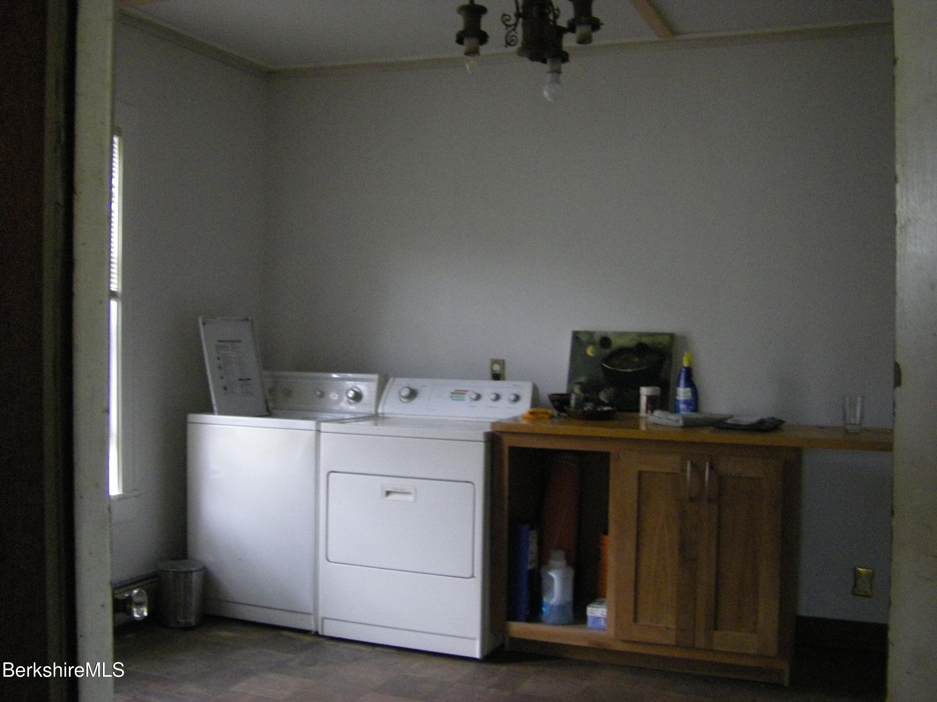 24 Franklin Street North Adams, MA 01247 - Photo 23 of 45 a view of storage and utility room with washer and dryer