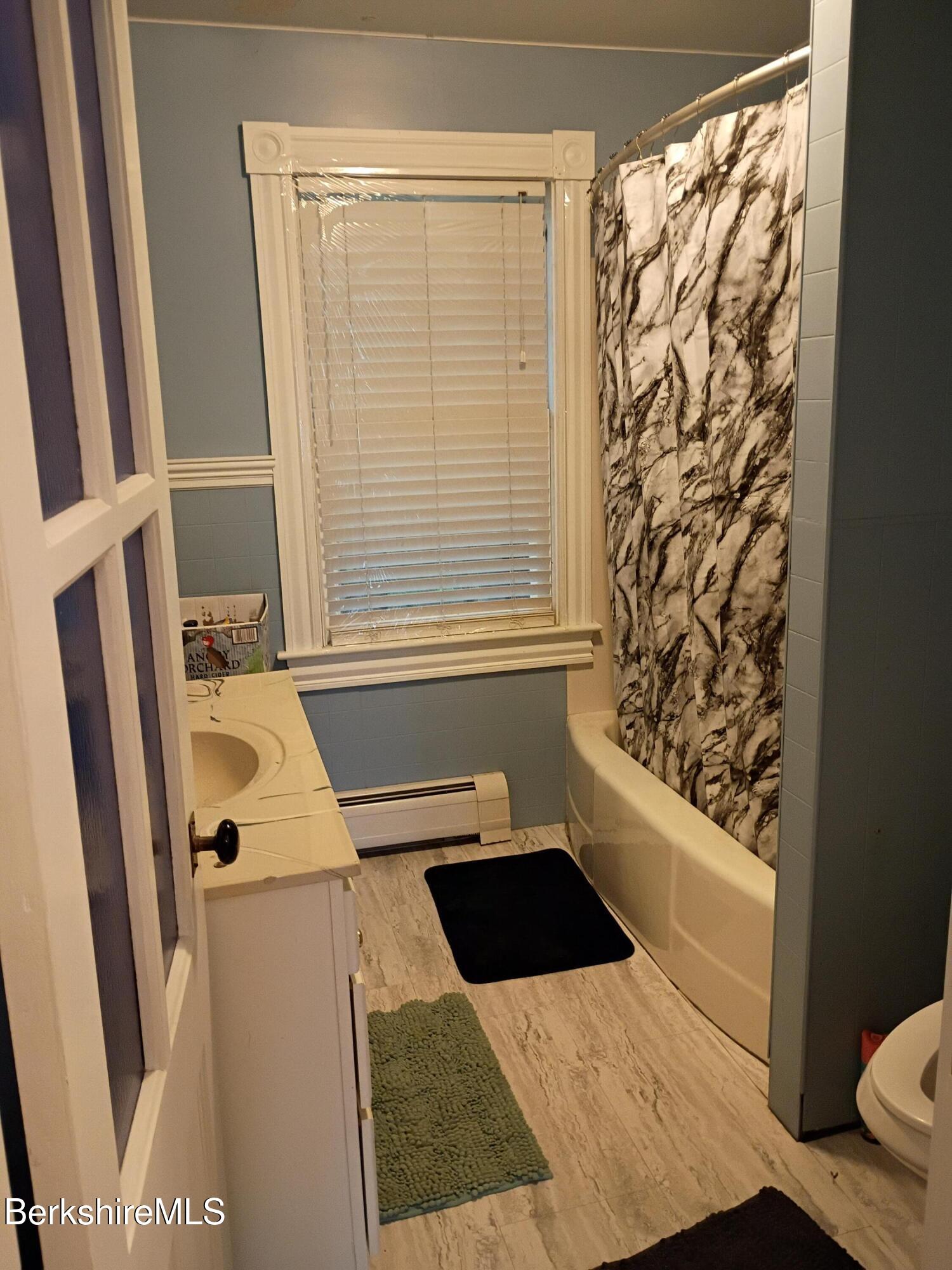 24 Franklin Street North Adams, MA 01247 - Photo 29 of 43 a bathroom with a sink and a mirror