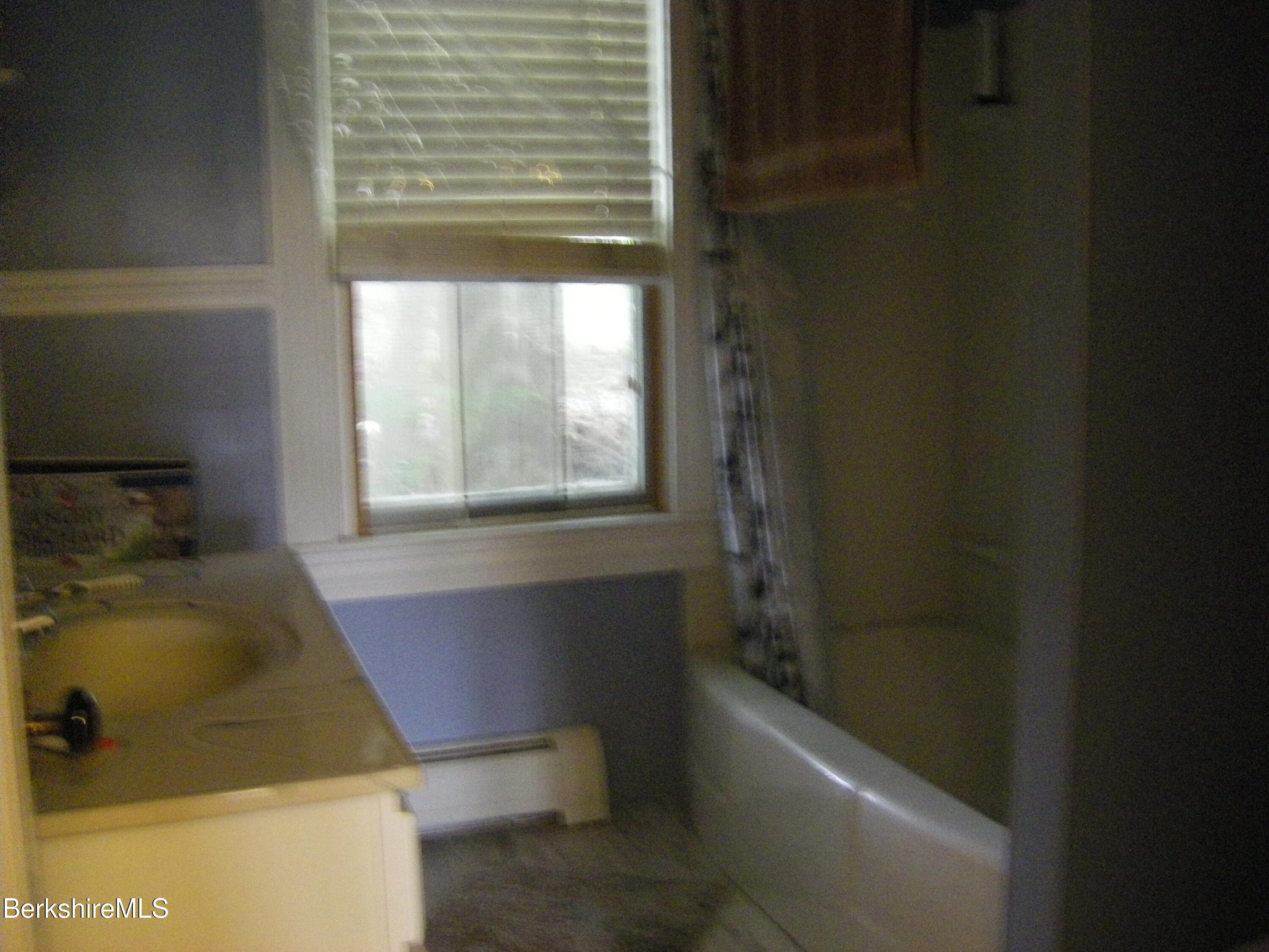 24 Franklin Street North Adams, MA 01247 - Photo 30 of 45 a bathroom with a bathtub and window