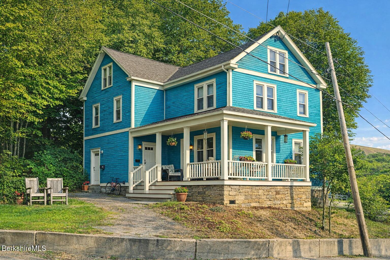 24 Franklin Street North Adams, MA 01247 - Photo 3 of 45 a front view of a house with a yard