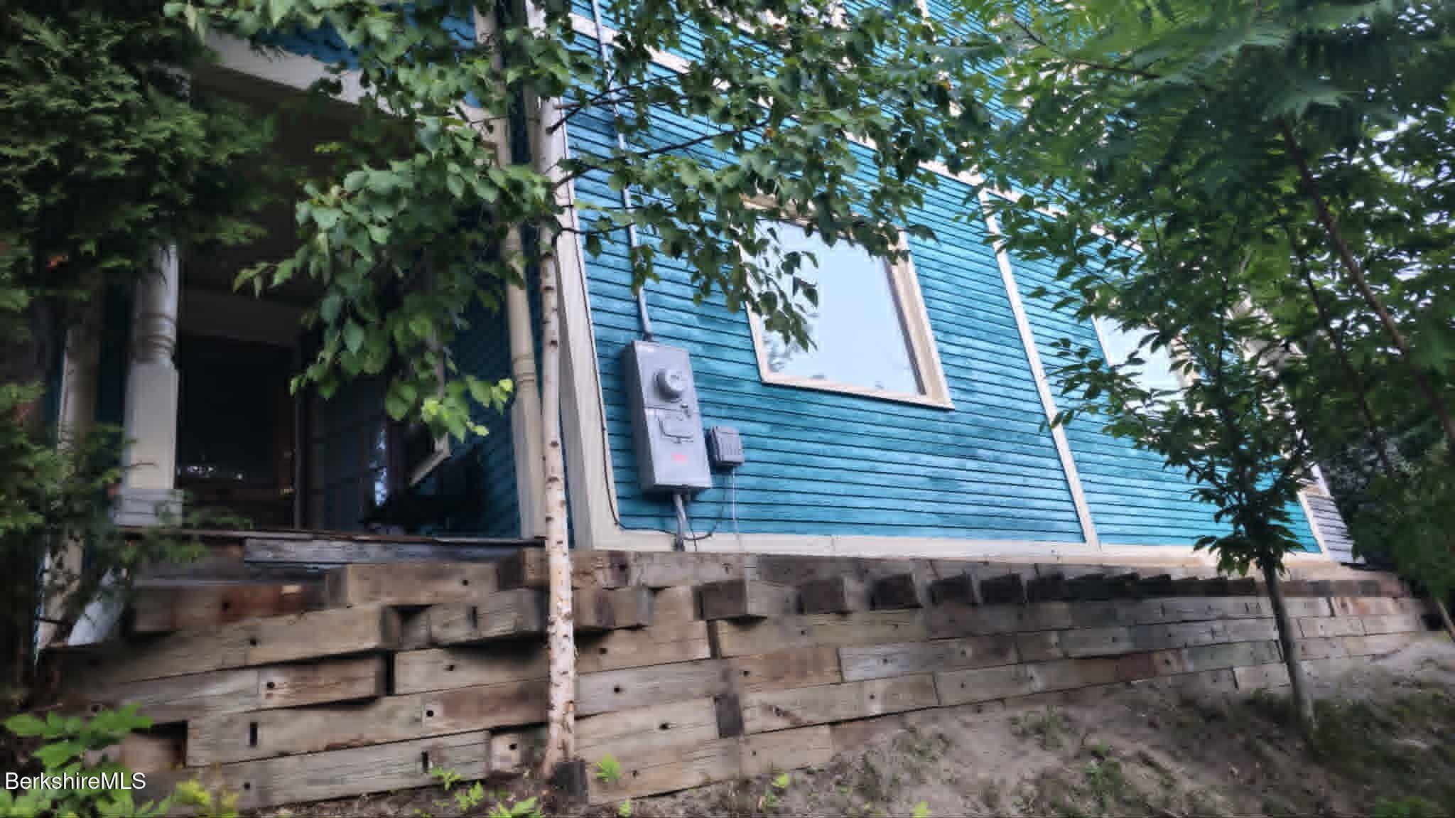 24 Franklin Street North Adams, MA 01247 - Photo 3 of 43 a view of a house with a tree