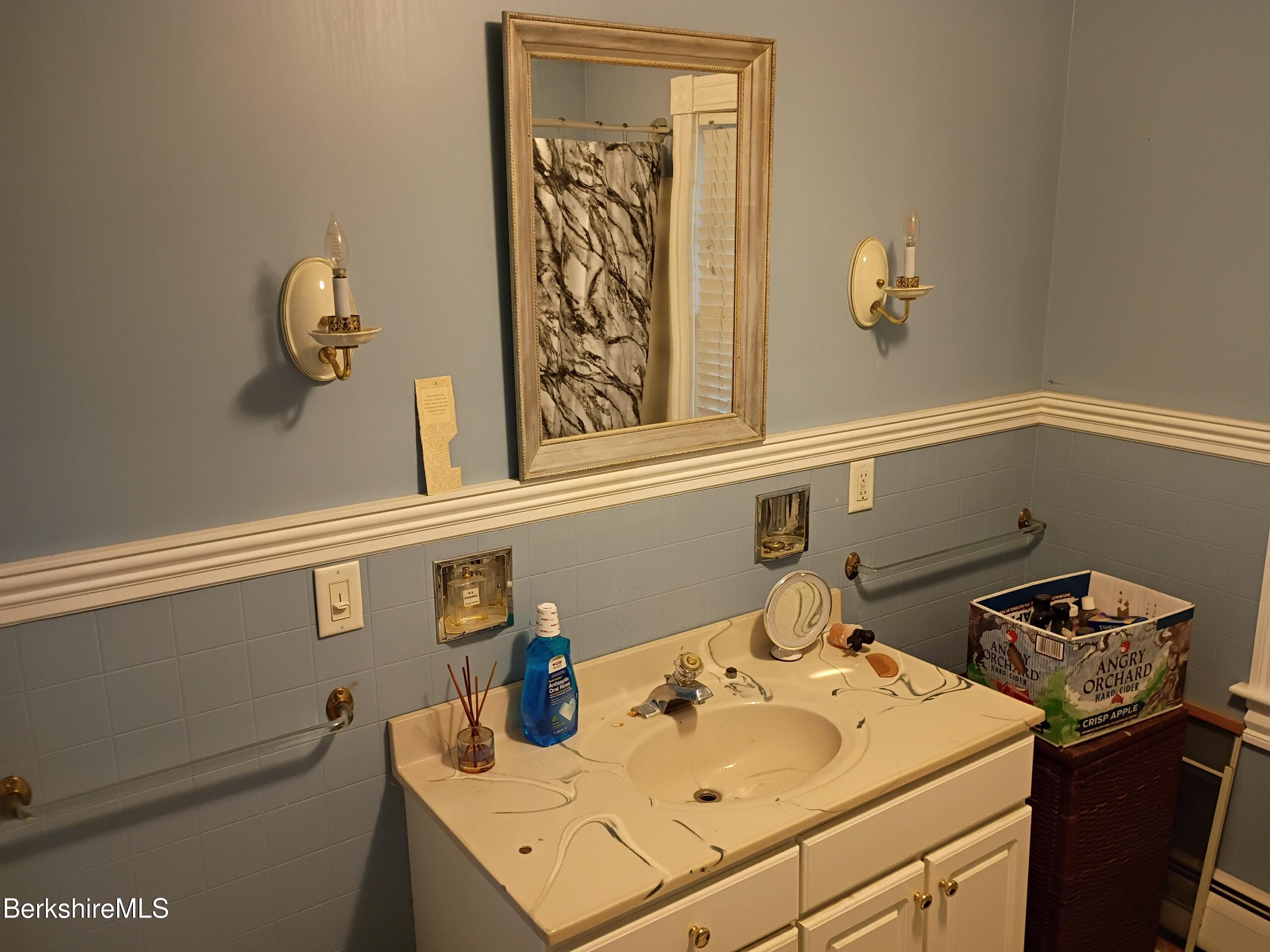 24 Franklin Street North Adams, MA 01247 - Photo 32 of 45 a bathroom with a sink and a mirror