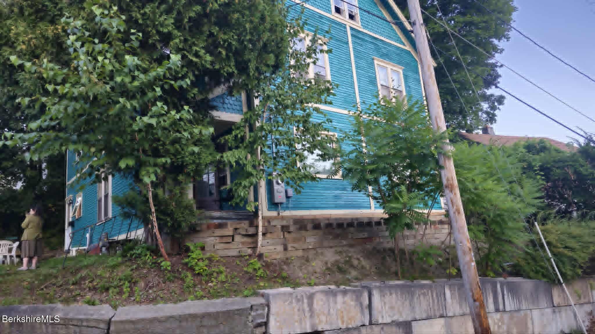 24 Franklin Street North Adams, MA 01247 - Photo 6 of 43 a view of a house with a tree