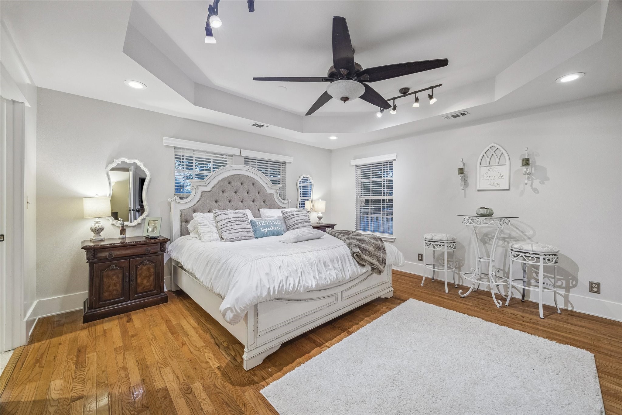 3515 County Road 36 Angleton, TX 77515 - Photo 23 of 50 a spacious bedroom with a bed and ceiling fan