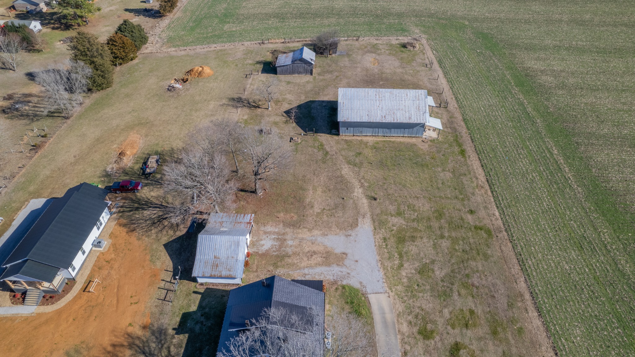 124 Beartown Road Loretto, TN 38469 - Photo 54 of 57 an aerial view of residential houses with outdoor space
