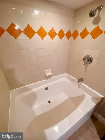 a bathroom with a sink and a bathtub