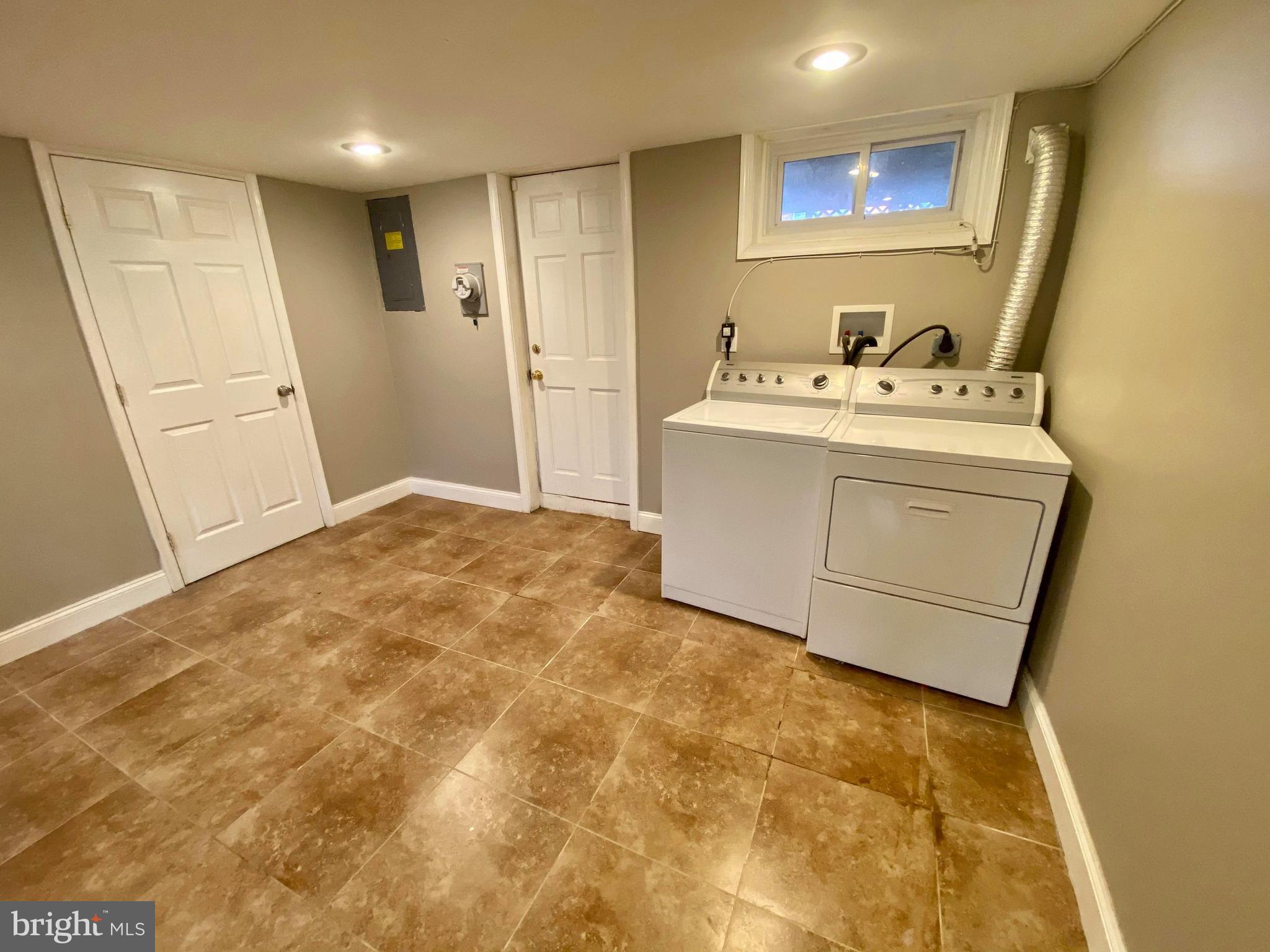 1604 Pentwood Road Baltimore, MD 21239 - Photo 19 of 19 a bathroom with a sink and a mirror