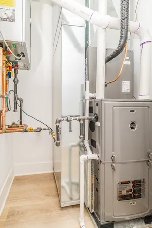 a view of a bathroom with a sink and a mirror