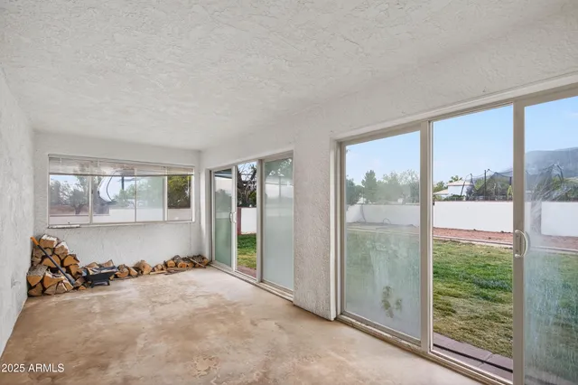 a view of a room with window and a livingroom