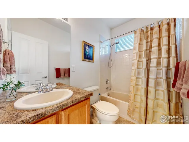a utility room with closet dryer and washer