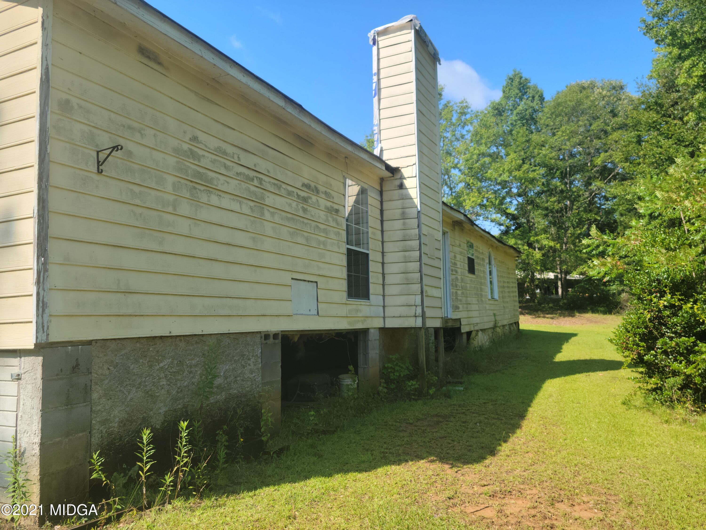 129 Reed Clark Road Dry Branch, GA 31020 - Photo 22 of 28 Reed Clark back of house