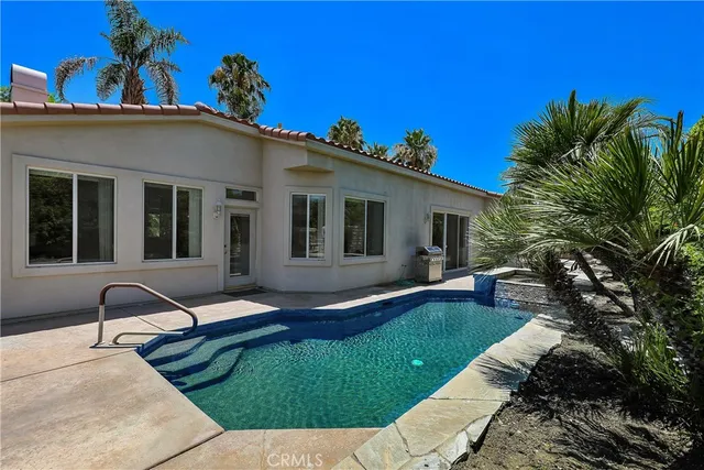 a house view with a outdoor space