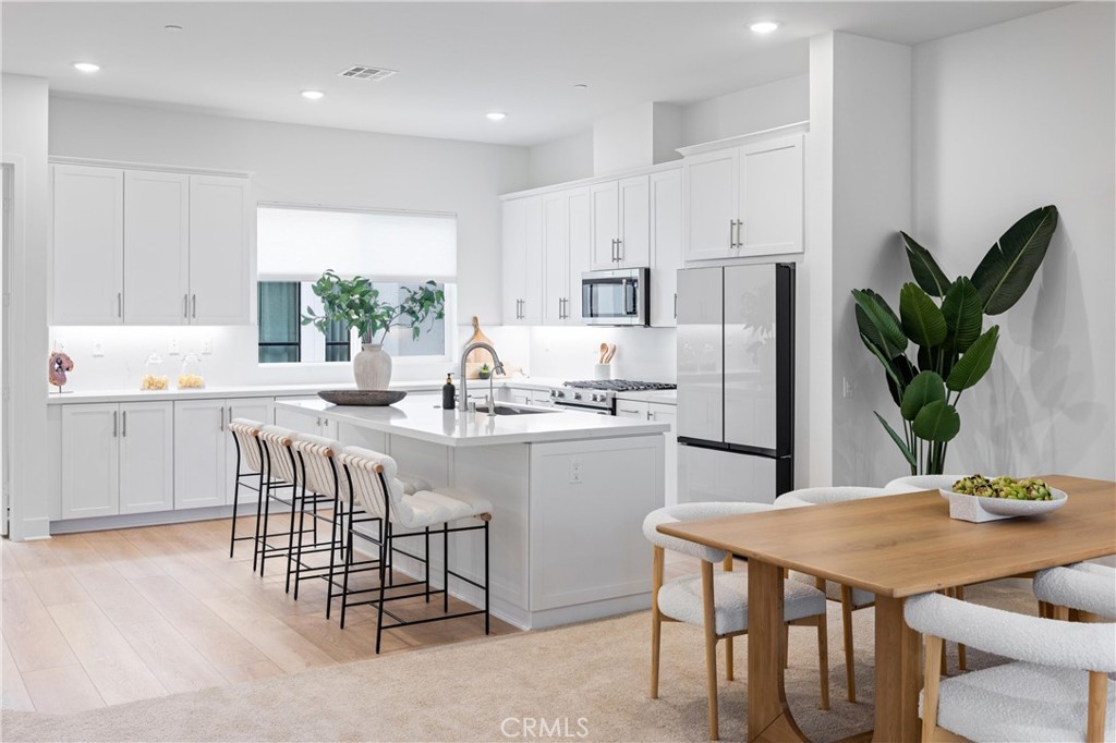 2132 Skylar Place Tustin, CA 92782 - Photo 8 of 34 Gourmet kitchen with quartz countertops and Shaker-style Euro cabinetry