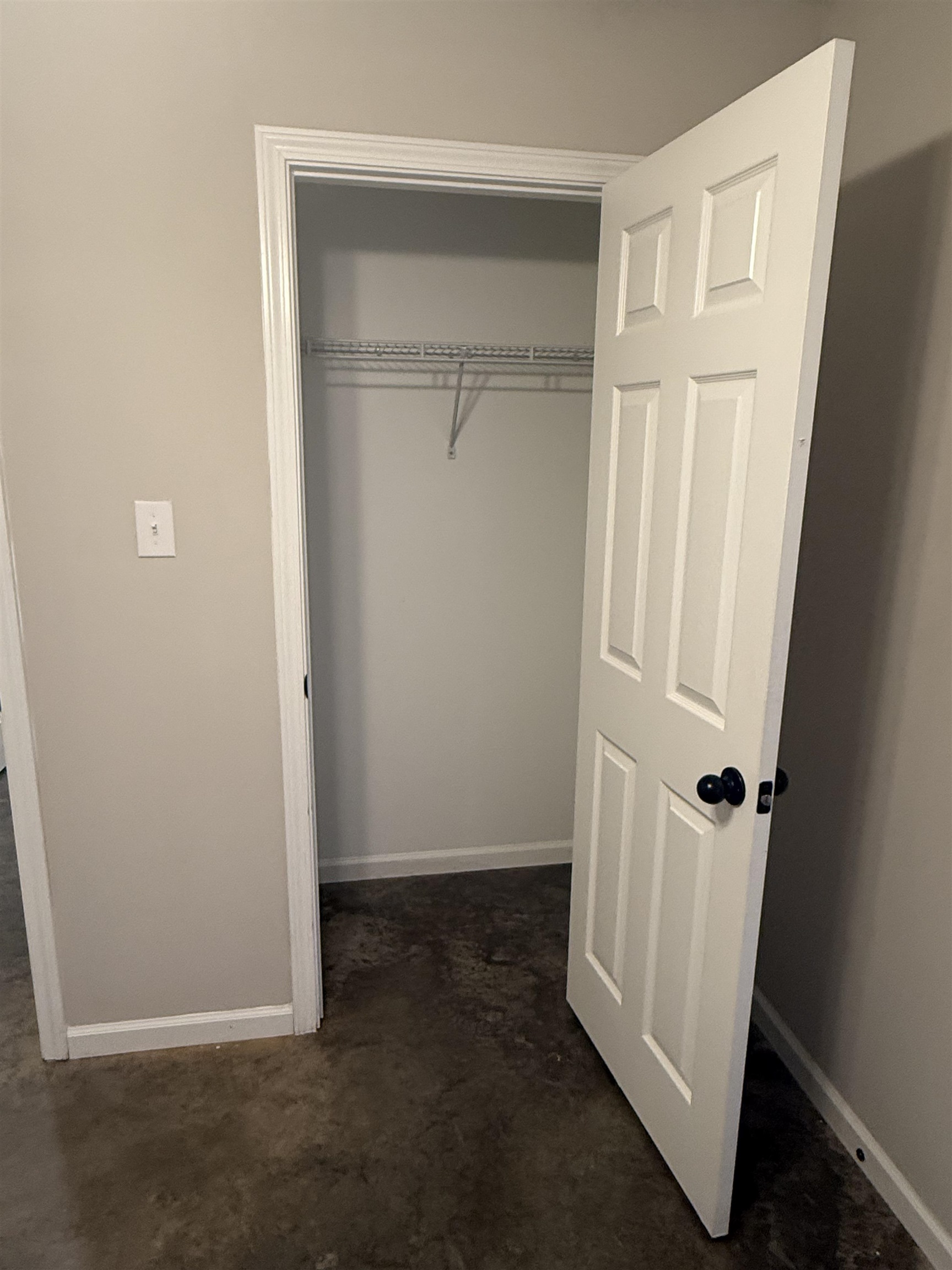 4589 Range Line Road Memphis, TN 38127 - Photo 15 of 25 an empty room with wooden floor