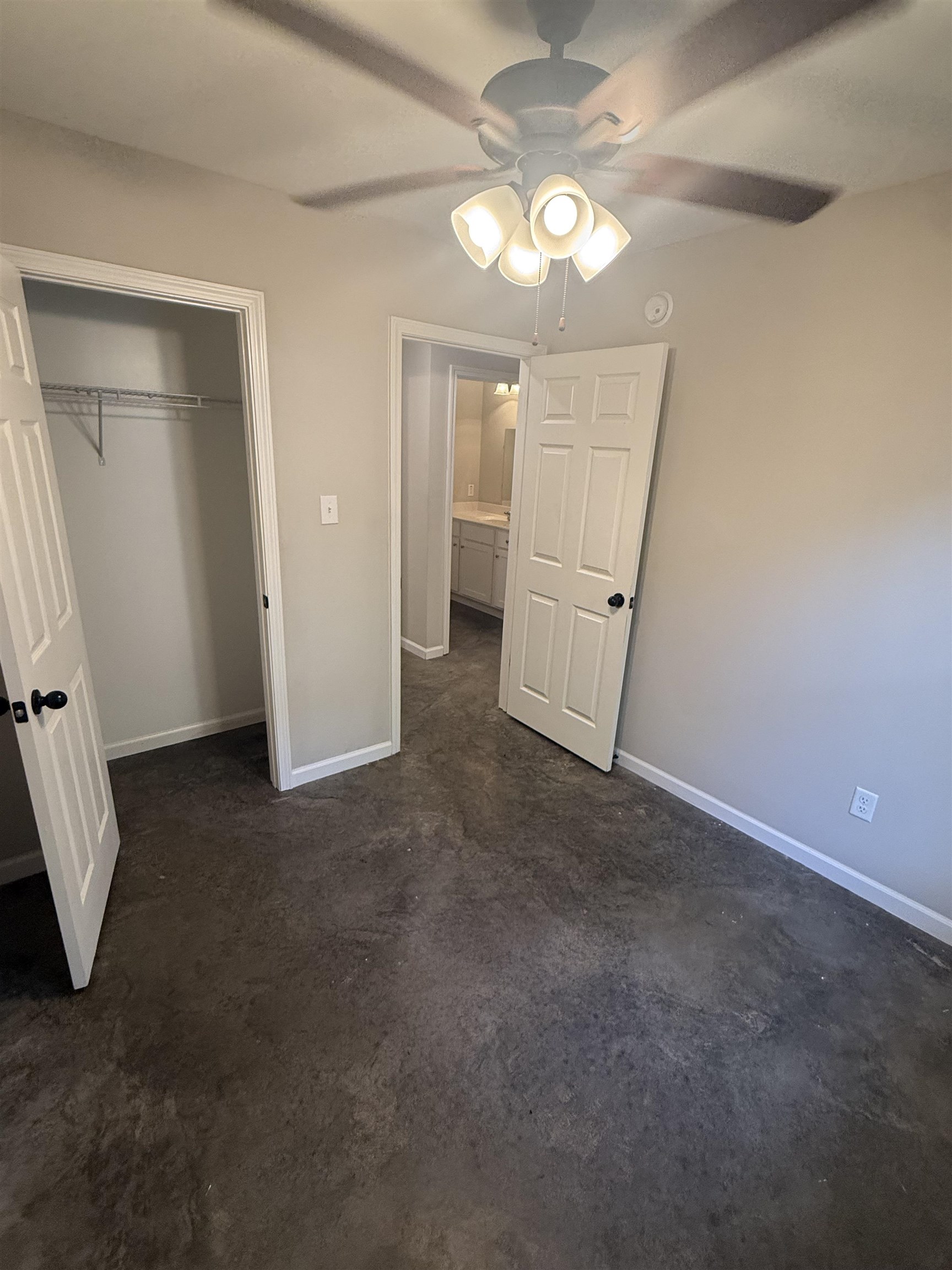 4589 Range Line Road Memphis, TN 38127 - Photo 17 of 25 wooden floor in an empty room with a window