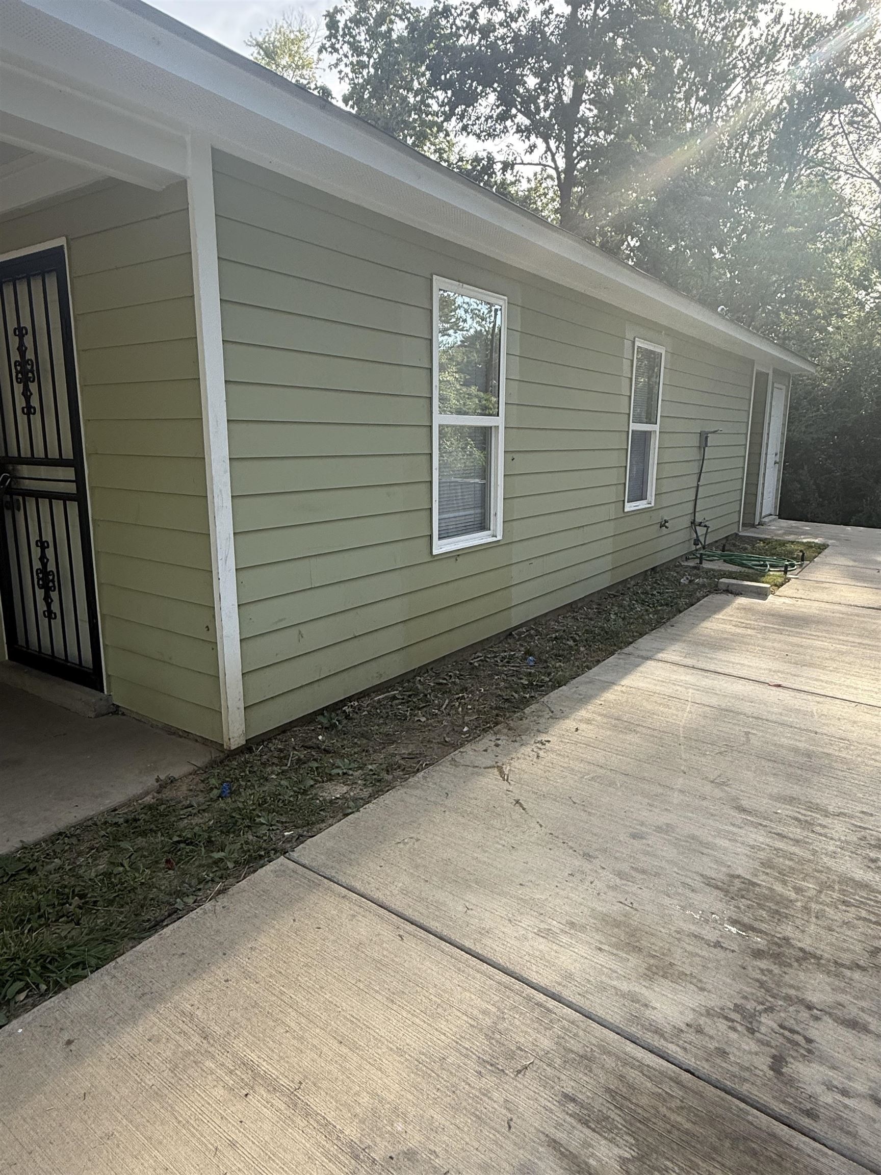 4589 Range Line Road Memphis, TN 38127 - Photo 2 of 25 a view of backyard of the house