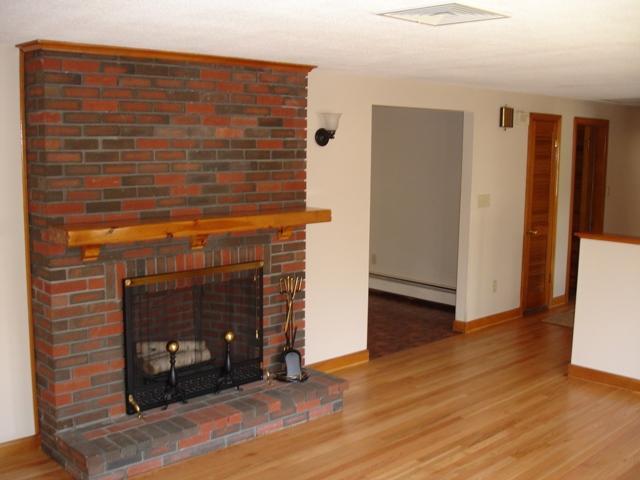 54 Ocean House Road Cape Elizabeth, ME 04107 - Photo 3 of 20 Living Room. Fireplace in living room.