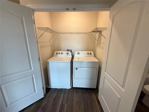 a utility room with dryer and washer