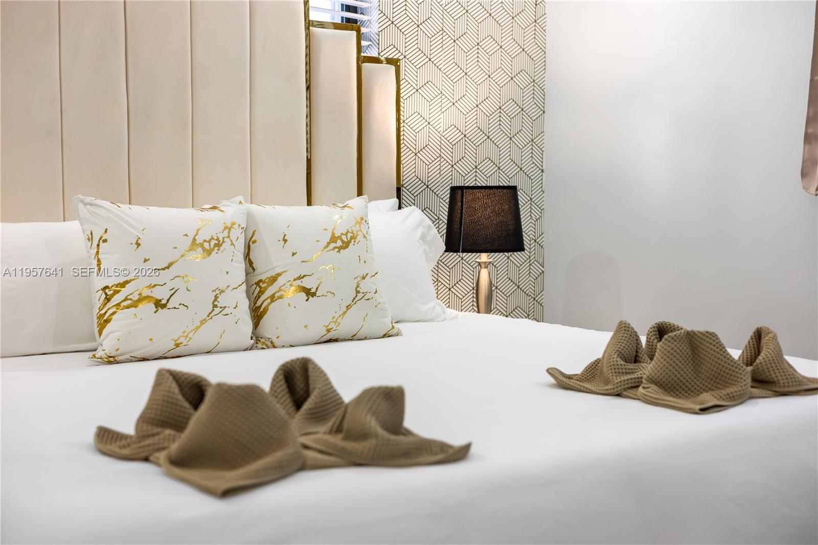 2532 Southeast 13th Street Pompano Beach, FL 33062 - Photo 18 of 69 a bedroom with a bed and a flat screen tv