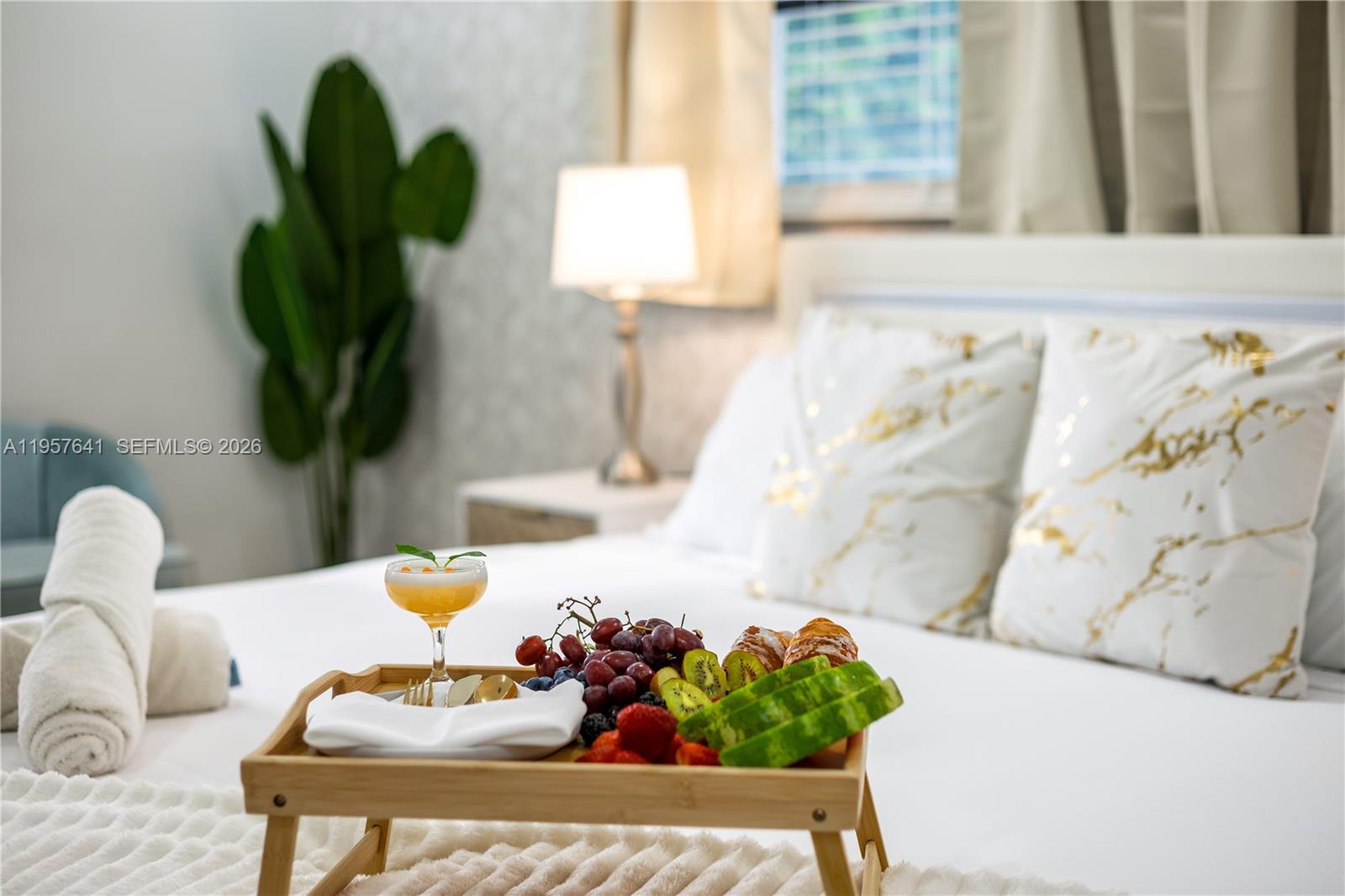 2532 Southeast 13th Street Pompano Beach, FL 33062 - Photo 20 of 69 a living room with furniture and a potted plant