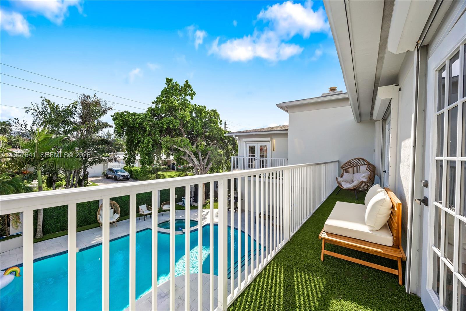 2532 Southeast 13th Street Pompano Beach, FL 33062 - Photo 25 of 69 a view of a balcony with two chairs