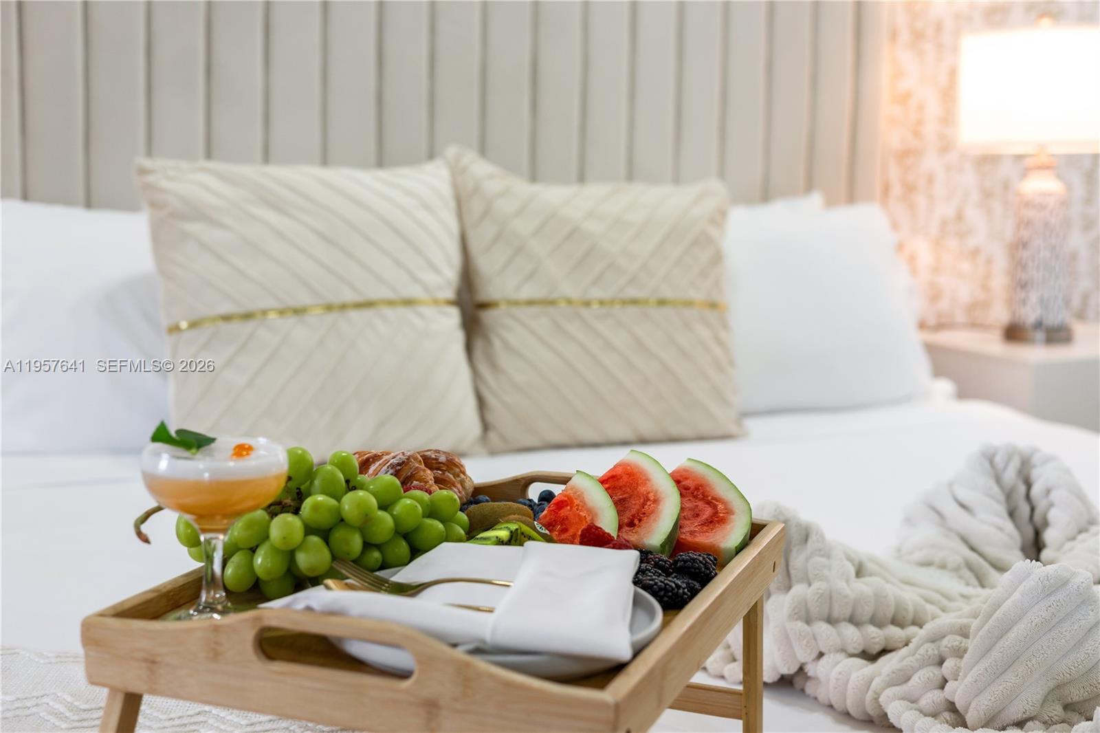 2532 Southeast 13th Street Pompano Beach, FL 33062 - Photo 35 of 69 a bedroom with a bed and a couch