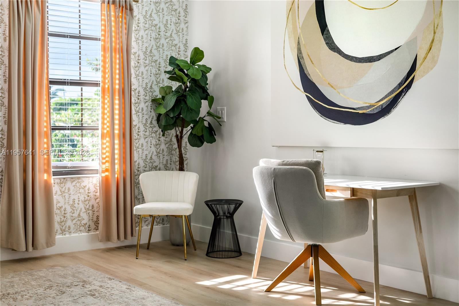 2532 Southeast 13th Street Pompano Beach, FL 33062 - Photo 36 of 69 a view of a workspace with furniture and a window