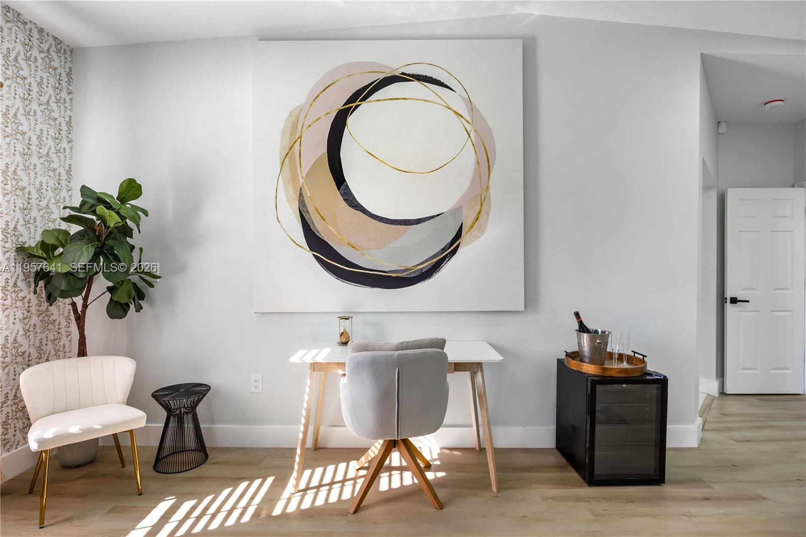 2532 Southeast 13th Street Pompano Beach, FL 33062 - Photo 38 of 69 a living room with furniture and a potted plant