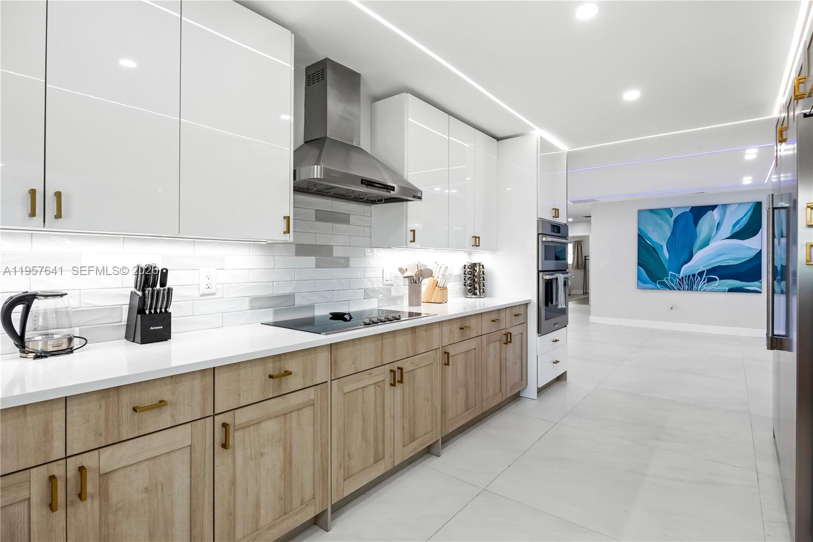 2532 Southeast 13th Street Pompano Beach, FL 33062 - Photo 45 of 69 a kitchen with sink cabinets and window