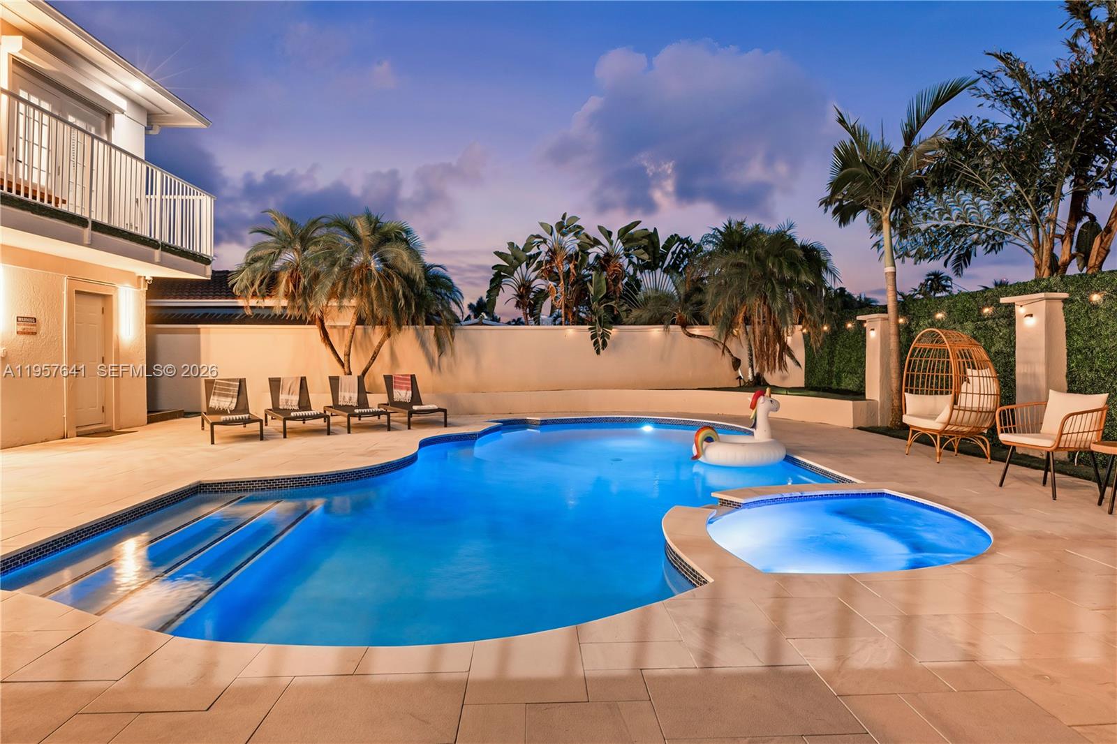 2532 Southeast 13th Street Pompano Beach, FL 33062 - Photo 56 of 69 a swimming pool with outdoor seating
