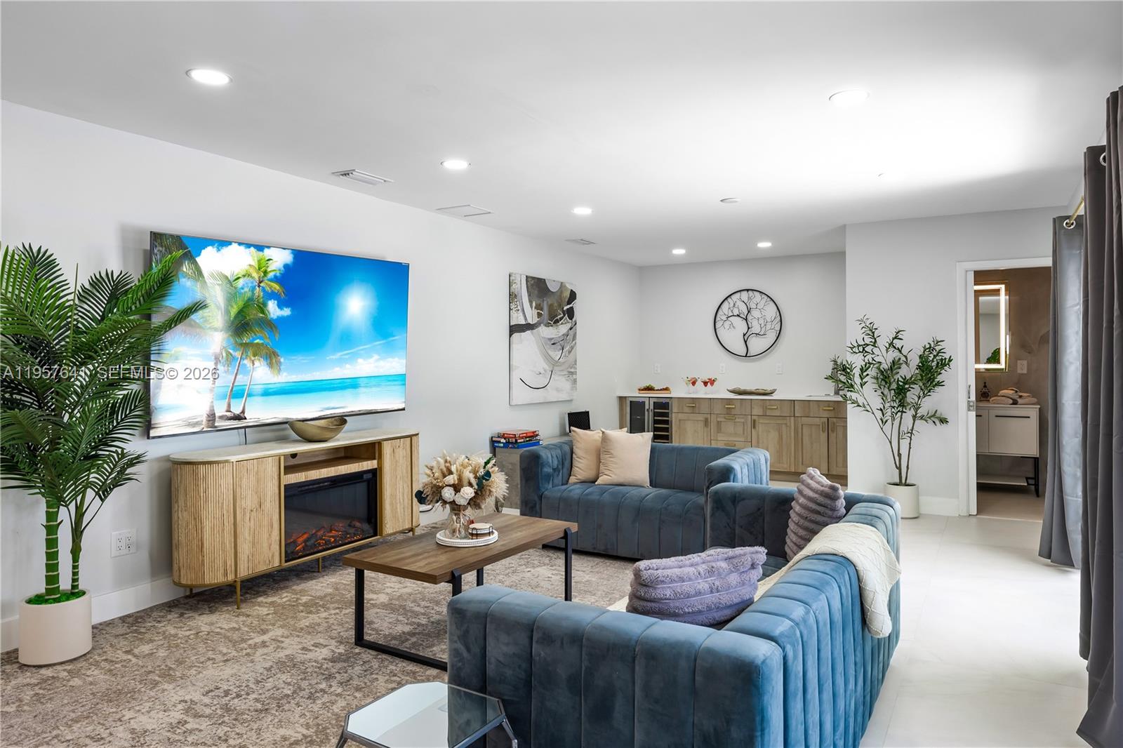 2532 Southeast 13th Street Pompano Beach, FL 33062 - Photo 61 of 69 a living room with furniture kitchen view and a potted plant
