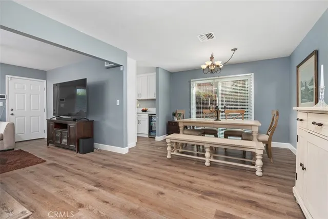 a view of a livingroom with furniture and windows