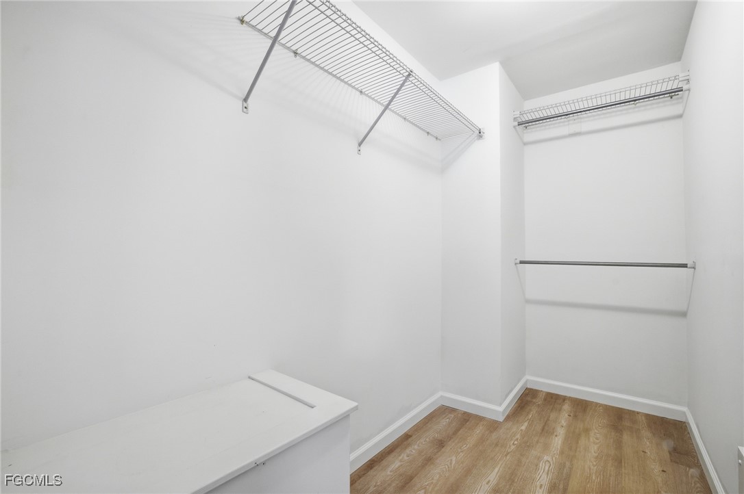 14736 Patrick Henry Road North Fort Myers, FL 33917 - Photo 20 of 47 a view of a room with racks on the wall