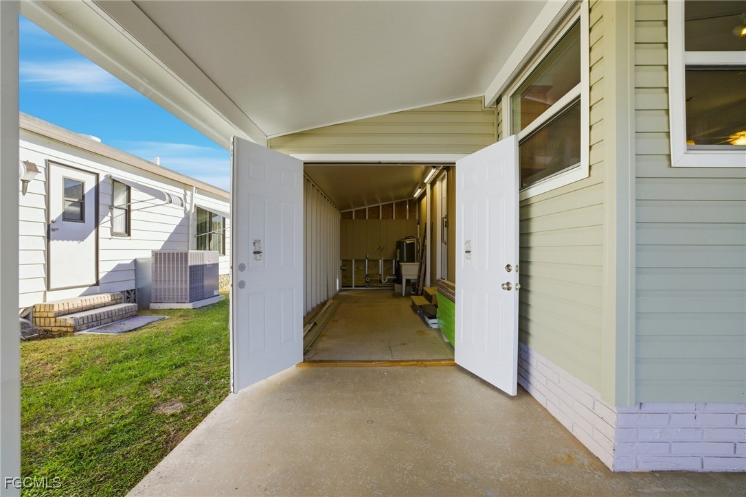 14736 Patrick Henry Road North Fort Myers, FL 33917 - Photo 34 of 47 a view of a porch in front of a house