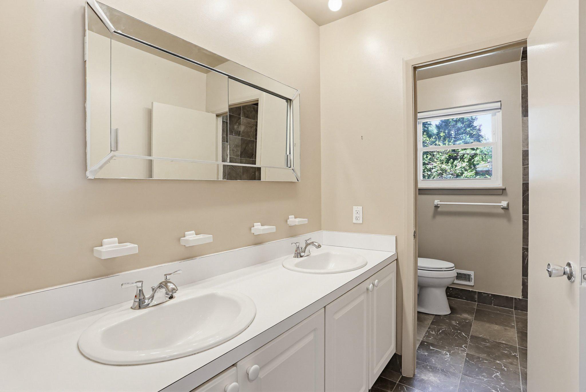 8145 Scotts Level Road Pikesville, MD 21208 - Photo 24 of 45 Bathroom #2 with double sink and tub/shower