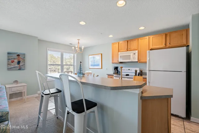 $299,900 | 3350 Club Villas Drive, Unit 1706, Southport, NC 28461