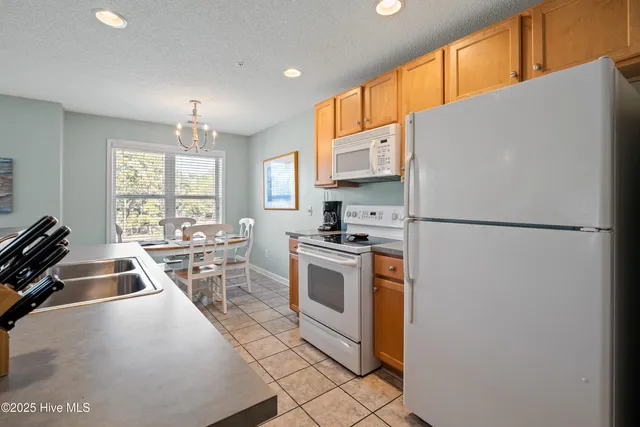 $299,900 | 3350 Club Villas Drive, Unit 1706, Southport, NC 28461