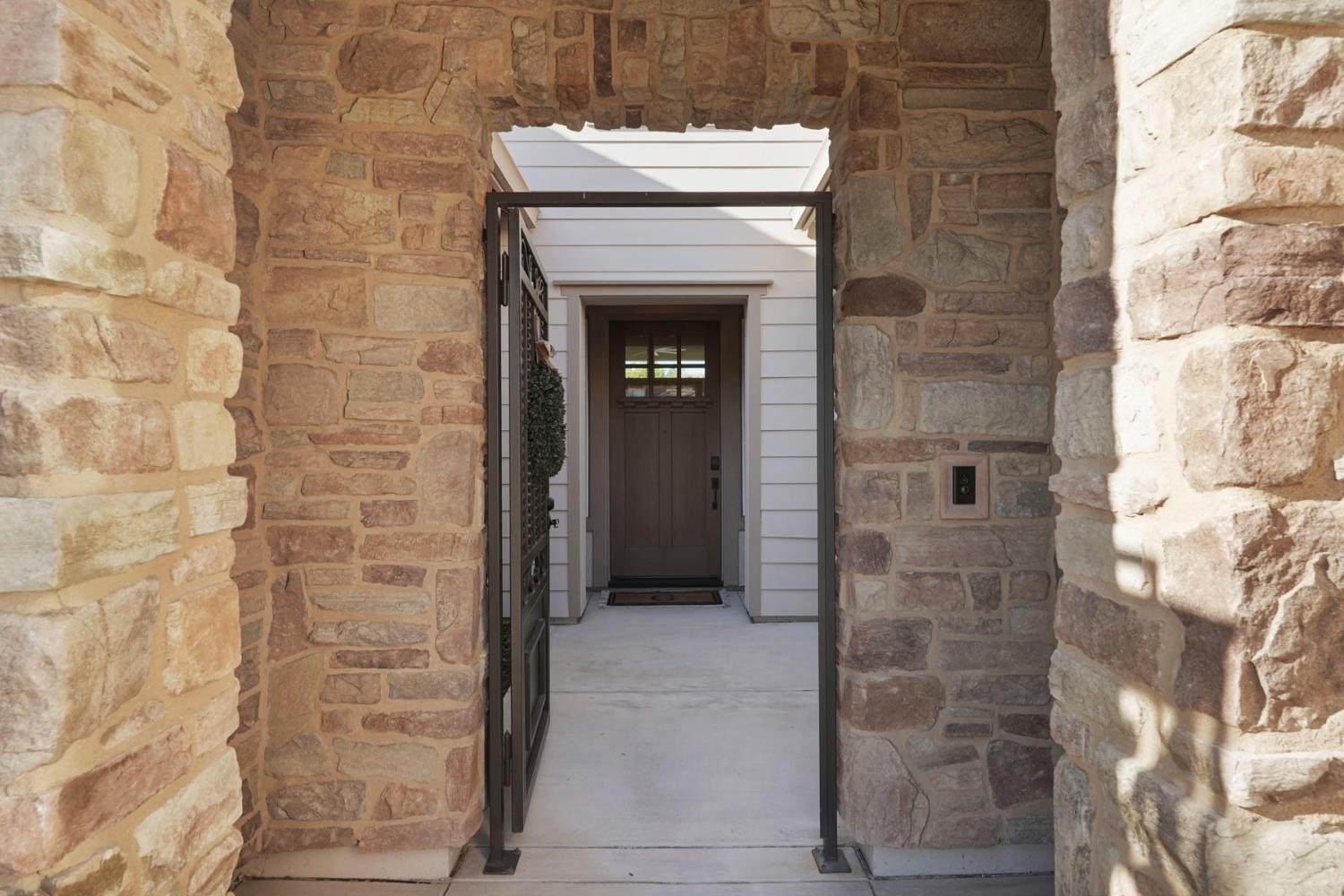 2931 Concerto Court Lodi, CA 95242 - Photo 11 of 54 The gorgeous stone at entry to gated patio.