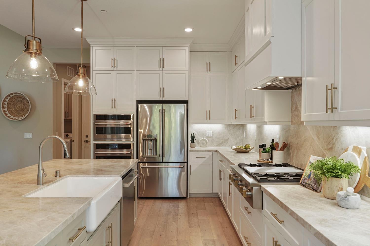 2931 Concerto Court Lodi, CA 95242 - Photo 17 of 54 a kitchen with stainless steel appliances granite countertop a sink stove and refrigerator