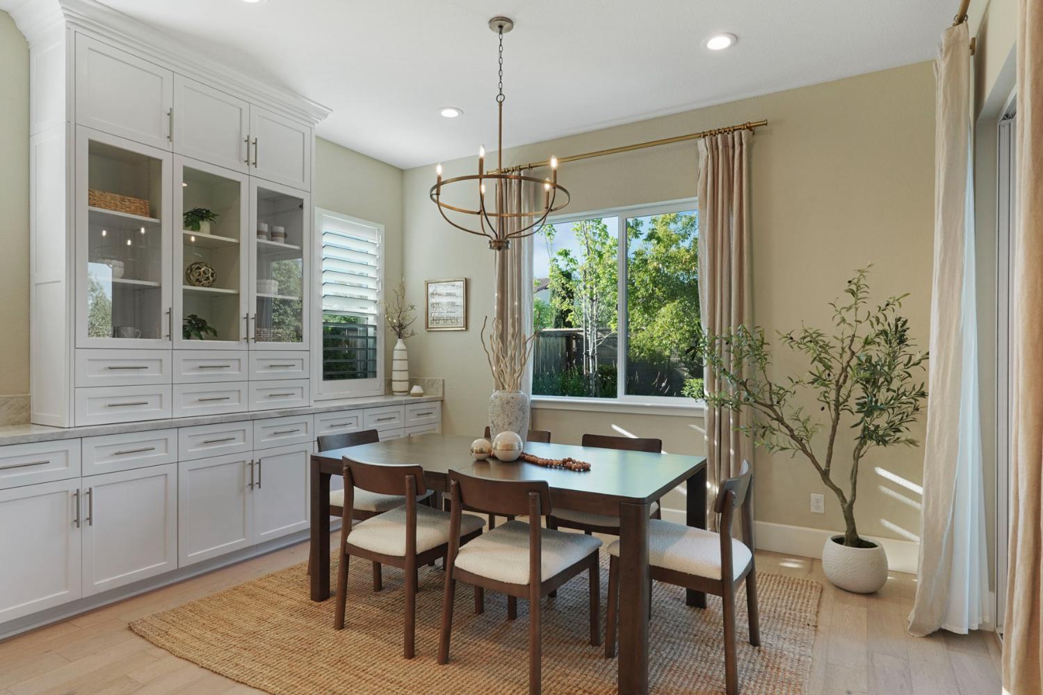 2931 Concerto Court Lodi, CA 95242 - Photo 21 of 54 a kitchen with a table and chairs in it