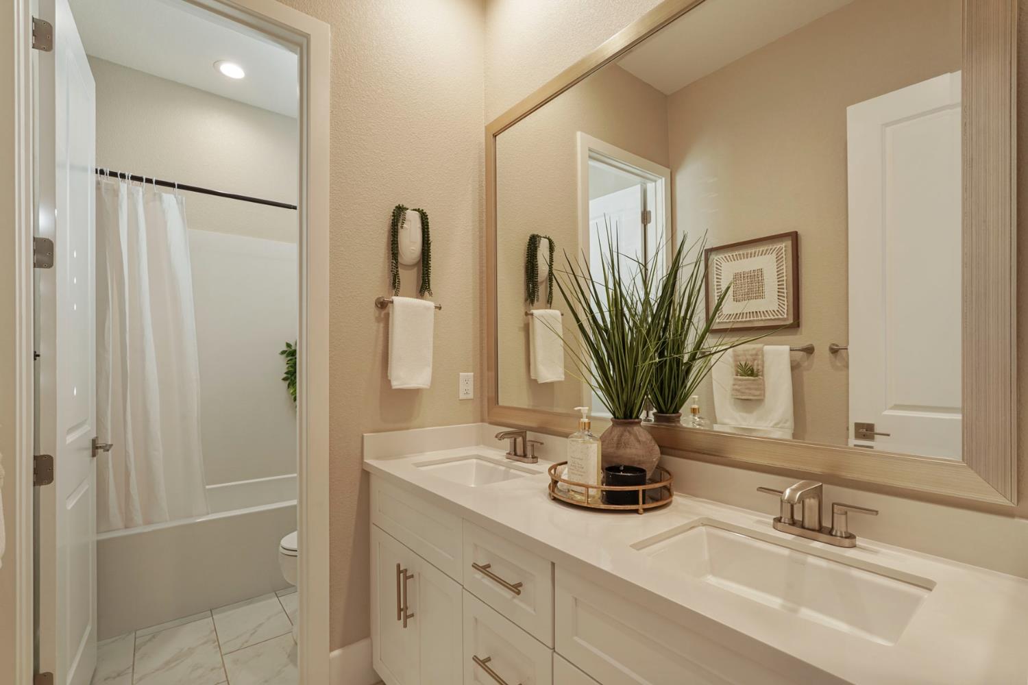 2931 Concerto Court Lodi, CA 95242 - Photo 28 of 54 a bathroom with a sink a toilet and a mirror