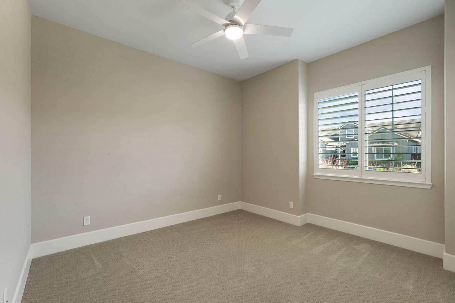 2931 Concerto Court Lodi, CA 95242 - Photo 30 of 54 an empty room with a window