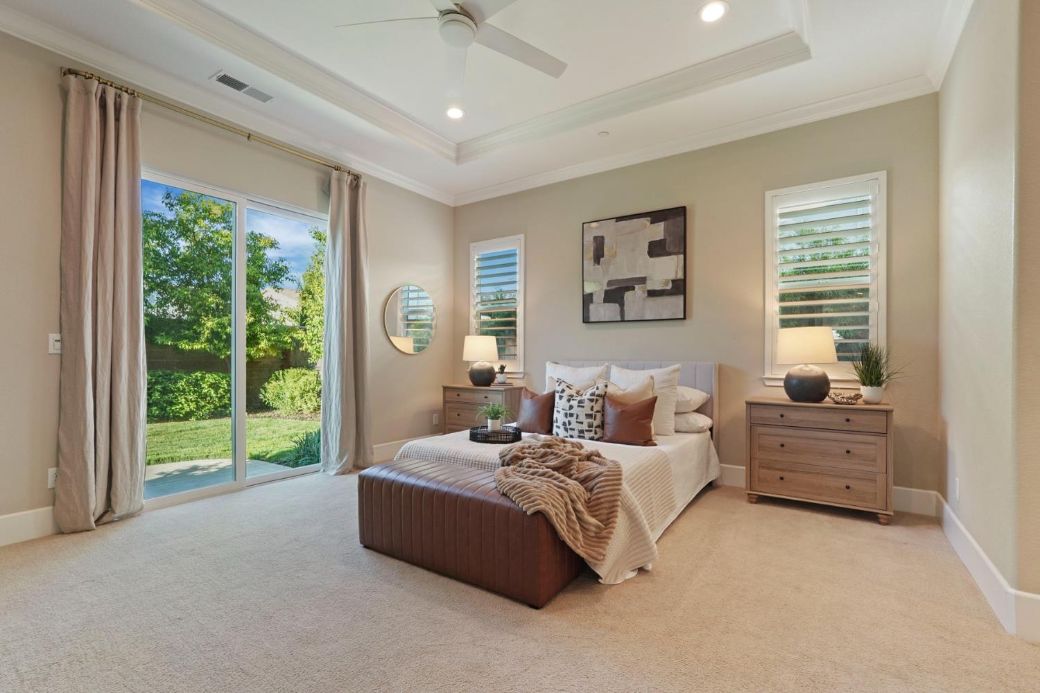 2931 Concerto Court Lodi, CA 95242 - Photo 36 of 54 a spacious bedroom with a bed and a large window