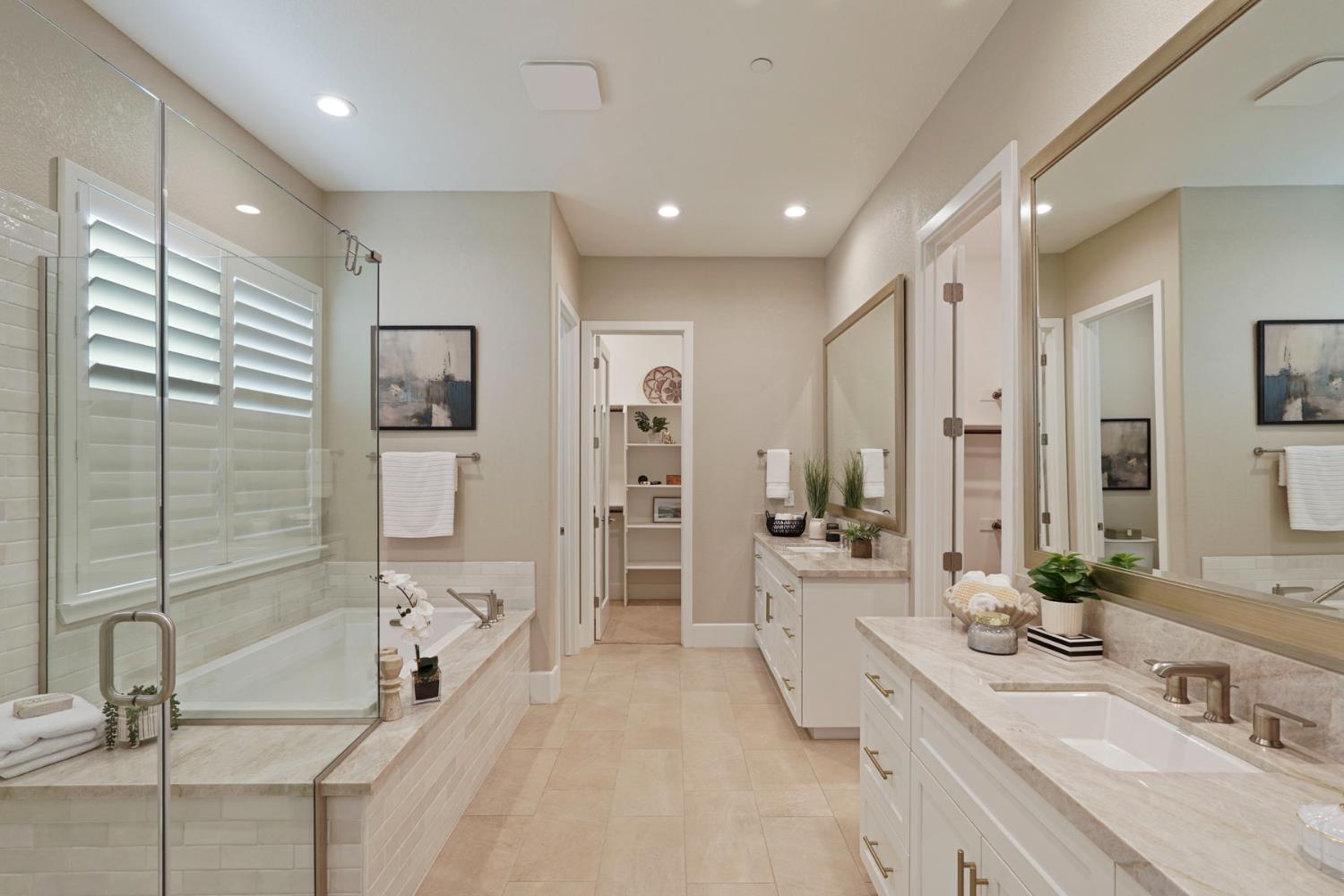 2931 Concerto Court Lodi, CA 95242 - Photo 42 of 54 a bathroom with a double vanity sink mirror and shower