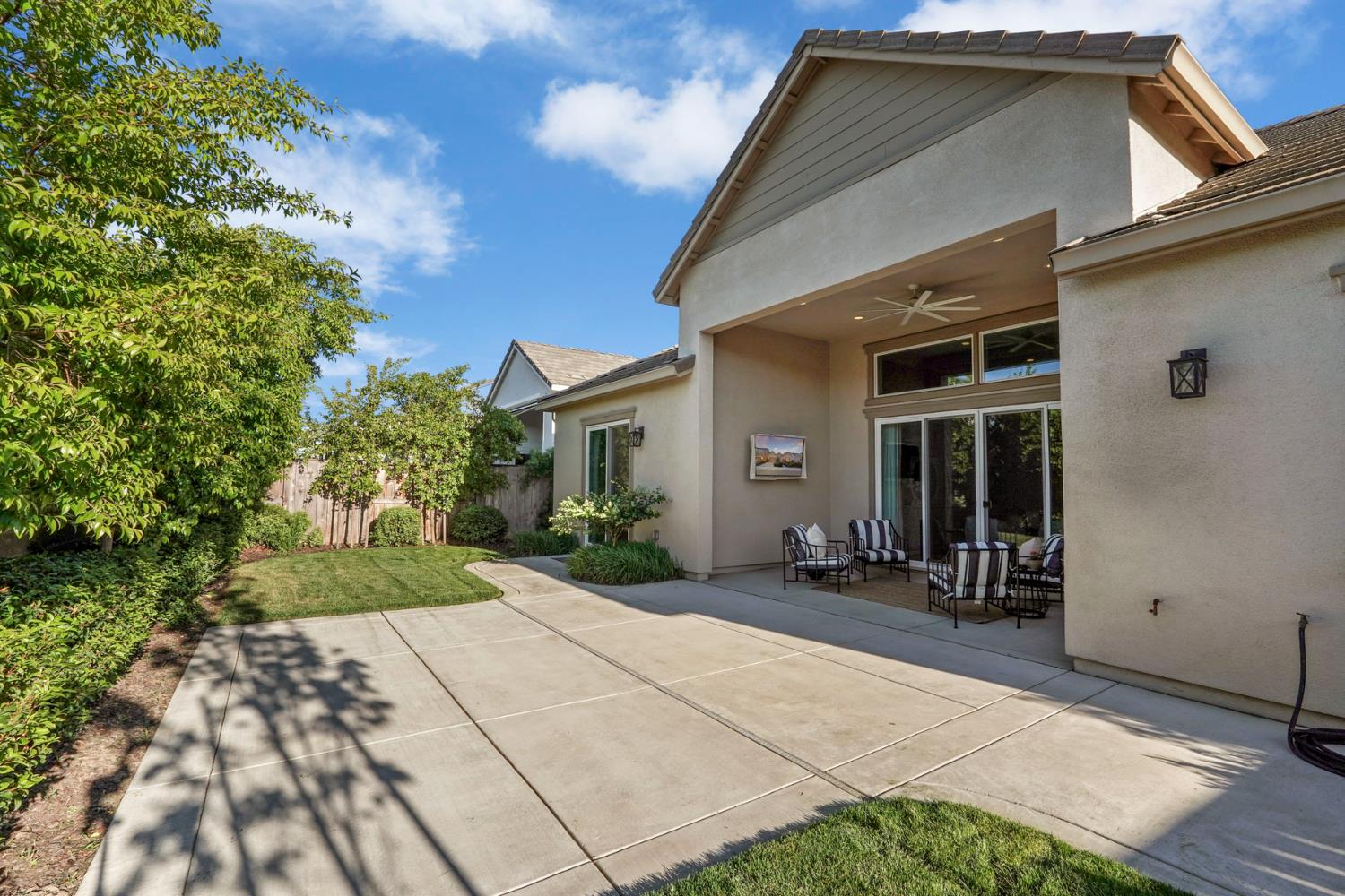 2931 Concerto Court Lodi, CA 95242 - Photo 46 of 54 a backyard of a house with outdoor seating