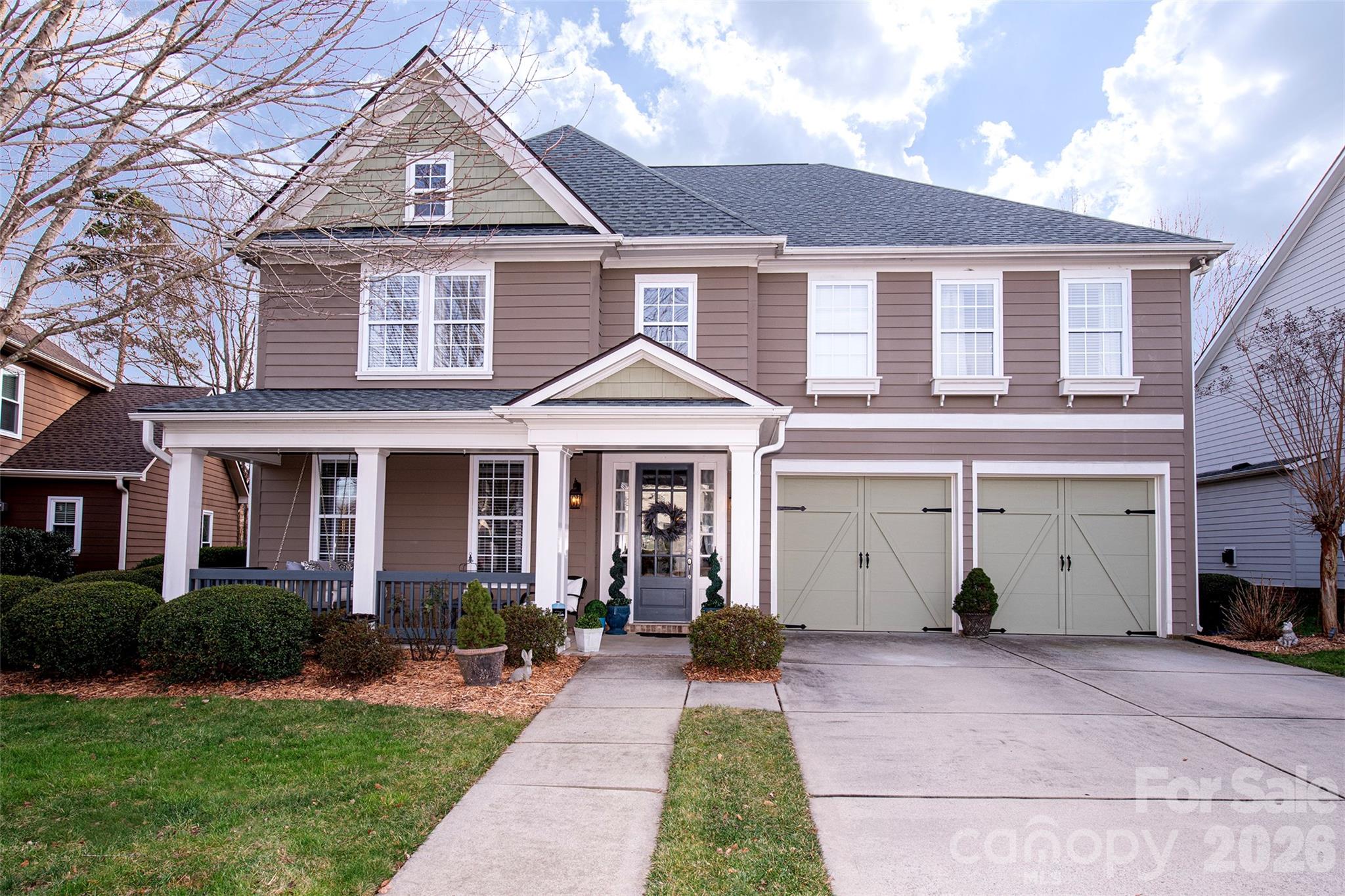 18432 East Marbella Lane Fort Mill, SC 29707 - Photo 1 of 47 a front view of a house with a garden